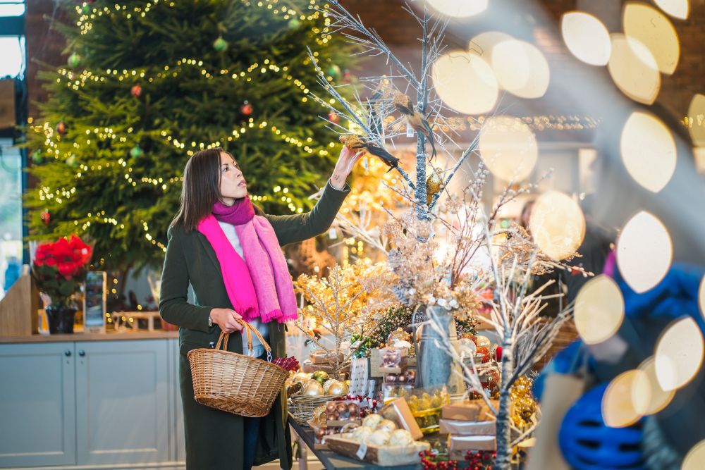 Woman shopping in The Savill Garden Shop